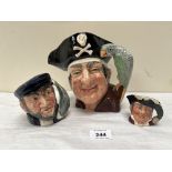 A Royal Doulton character jug, Long John Silver D6335; together with two small Royal Doulton jugs,