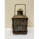 A brass lantern converted for electric light