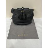 A Mulberry leather heandbag with storage bag