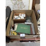 A box of ephemera and crested ware