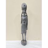 An African carved ebony sculpture of a woman. 25' high
