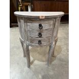 A limed birch three drawer demi-lune side table. 21½' wide