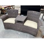 A loom style two seater conservatory sofa. 70' wide