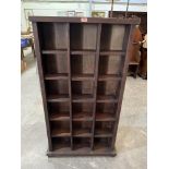 A 'Blue Bone' dark pine CD rack. 55½'h x 30'w