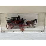 A cased scratch-built wooden Royal Mail carriage. The case 16' wide