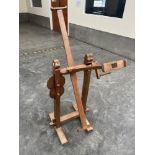 A treen click or clock reel wool winder used to measure yarn into lengths or skeins. 19th century.