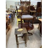 An oak carved elbow chair, a nest of two tables and an oak low table on tripod support (3)