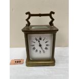An early 20th century French brass carriage timepiece. 4' high