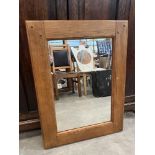 A medium oak mirror. 31½' x 23½'