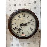 A Victorian mahogany English dial wall clock, the two train fusee movement striking the hours on a