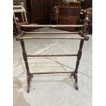 A Victorian mahogany towel rail