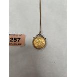 A George V gold sovereign, 1911, in 9ct pendant setting