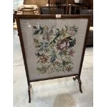 A mahogany framed tapestry firescreen. 32' high