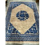 An oriental blue and pink ground wool carpet. 132' x 94'