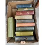 A box of books, sporting