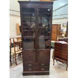 A mahogany glazed bookcase with base cupboard and two drawers. 32' wide x 82' high
