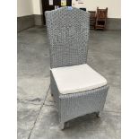 A grey painted loom bedroom chair