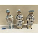 Three continental nodding ceramic figures. 6½' high