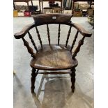A Victorian smoker's bow armchair (Worm but treated)