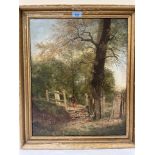 ENGLISH SCHOOL. 19TH CENTURY Woodland scene with figure. Oil on canvas 21' x 17'