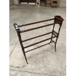 A late Victorian Arts and Crafts mahogany towel rail. 31' wide