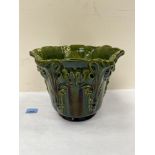 A Victorian Bretby jardiniere in a lustrous green glaze. 8' high