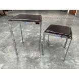Two leather topped and chrome based occasional tables