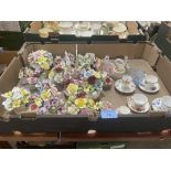 A box of ceramic posies etc.