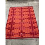 A red ground carpet. 76' x 57'