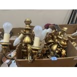 A set of nine giltwood twin branch wall lights