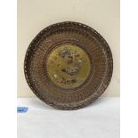 A Japanese copper basket weave dish, the centre a brass shubujama plaque. 10½' diam.