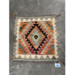 A Choli Kilim rug. 0.5m x 0.5m