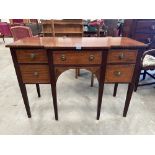 A Sheraton style mahogany line inlaid breakfronted sideboard with five drawers on square legs. 49'