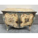 An early 20th century French serpentine bombe commode, foliate polychrome decorated, with gilt metal