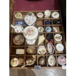 A tray of ceramic boxes etc.