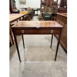 A mahogany crossbanded side table with frieze drawer on square tapered legs. 32' wide