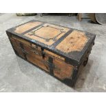An eastern pine and iron bound chest with brass domed nail decoration. 36' wide