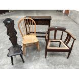 An Edward VII inlaid elbow chair; a Welsh spinning chair; a stickback chair and a hall table (4)