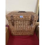 A wicker hamper. 15' high