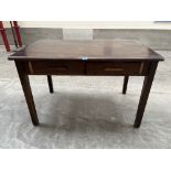 An oak office table with a pair of frieze drawers. 48' wide