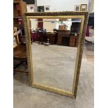 A gilt framed wall mirror with bevelled plate. 38' x 26'