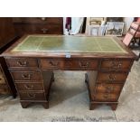 A mahogany pedestal desk with inlet leather top. Of recent manufacture. 48' wide