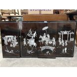 A set of four oriental lacquer and mother of pearl pictures, each 23' x 11'