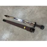 A re-enactment sword with leather scabbard. Length of blade 30'