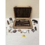A cased silver backed manicure set (scissors associated) with a quantity of small sundry objects