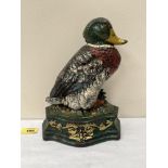 A painted cast iron doorstop in the form of a duck. 9½' high