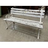 A painted cast iron and wood slatted garden seat. 48' long