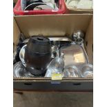 A box of stainless steel cookware and a box of glassware