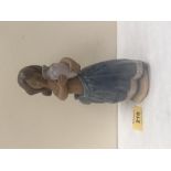 A Lladro figure of a young girl with a pot. 7½' high
