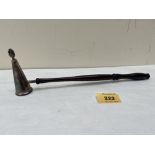 An Elizabeth II silver candle snuffer with turned treen handle. Birmingham 1989. 11' long